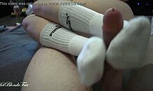 miley grey gives me a sexy footjob with her long socks on, rubbin my monster cock