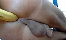 Hey, check out this muscular guy fucking his ass with a big banana 🍌