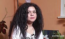 German-Brazilian babe masturbates wetly in front of camera, showing natural tits and feet.