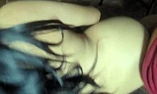 Student studies with classmate in uniform at home.