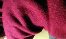 Student studies with classmate in uniform at home.