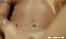 Horny Wife Rolling On Bed In Masturbating Session With Toys