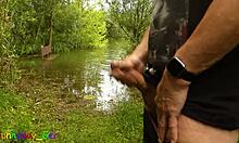 gay guy jerks off by the lake and fingers his tight hole s