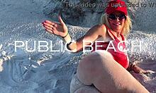 hot milf teases her wet pussy on a crowded public beach.
