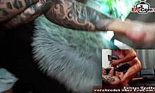 German tattooed babe with big tits fucks in front of the webcam.