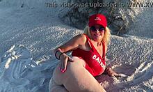 hot milf teases her wet pussy on a crowded public beach.