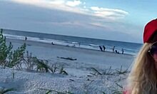 hot milf teases her wet pussy on a crowded public beach.