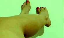 Cute girl shows her legs then masturbates wet pussy