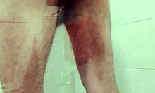 amateur gay guy relaxing in the shower after a long day