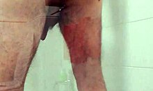 amateur gay guy relaxing in the shower after a long day