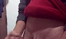 skinny amateur jerks off with clothes on in solo masturbation