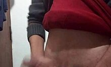 skinny amateur jerks off with clothes on in solo masturbation