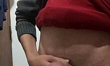 skinny amateur jerks off with clothes on in solo masturbation