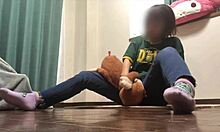 Feeling Horny, She Rubs Her Pussy Against A Doll Imagining A Man