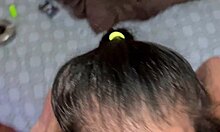 She gets fucked while smoking a cigarette, then takes a cumshot on her lips.