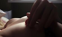 Beautiful teen slaps her tits and pussy closeup.