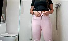 Latina teen soaps up her big ass and petite feet.