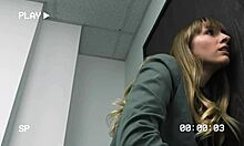 tiny blonde troublemaker gets footjob in security office