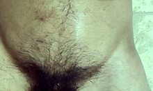 hey dude, watch this gay guy play with his belly and cum hard all over himself