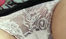 Brunette masturbates her hairy pussy.