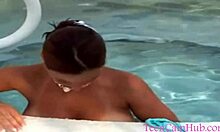 Big tits teen teases by the poolside bikini