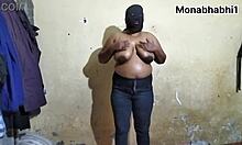 Beautiful desi bhabhi oils her huge boobs for massage.