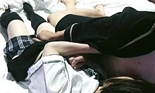 amateur japanese couple in beautiful costumes on the bed