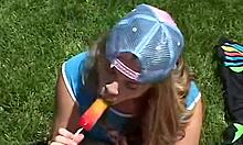 Hey, watch teen Little April rub clit outdoors with popsicle!