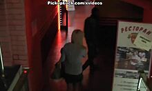 is this blonde with glasses sucking cock outdoors?