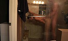 shower sex with nipples pressed against glass in steamy bathroom. blonde takes huge cock!