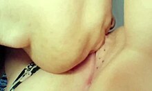 Young Babe in Garage Plays with Wet Shaved Pussy