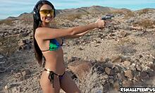 Showing off her cute tits outdoors