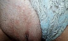 Redhead amateur takes dick in panties, holding cum after man cums