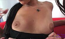 Two Beautiful Girls Relax On Orange Sofa With Intimate Touches