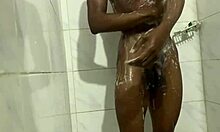 twink showers barefoot, close-up on ass and cock in homemade gay video