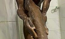 twink showers barefoot, close-up on ass and cock in homemade gay video