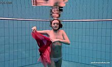 Yo, check Duna Bultihalo’s big tits underwater in that red dress! 😍