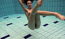 Yo, check Duna Bultihalo’s big tits underwater in that red dress! 😍