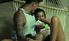 cute girl gives her boyfriend a handjob.