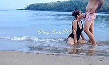 Cute young 18+ licks and rides cock cowgirl on beach