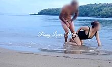 Cute young 18+ licks and rides cock cowgirl on beach