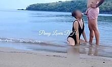 Cute young 18+ licks and rides cock cowgirl on beach