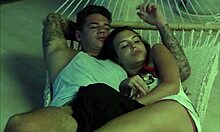 cute girl gives her boyfriend a handjob.