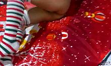Indian MILF enjoys Christmas dildo play in stockings
