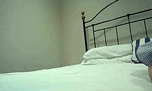 Adorable girl in shirt enjoys chatting with friends online