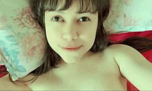 feeling the intense pleasure as young teen rubs her pussy to orgasm in close-up.