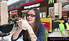 Oiled brunette babe gives public blowjob to stranger and swallows cum at resort