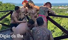 redhead and blonde amateurs have balcony orgy with big asses