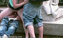 petite 18+ girl dares to suck cocks and fuck in public threesome by famous city statue