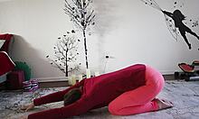 yoga lesson with mature instructor teaching poses to her friend